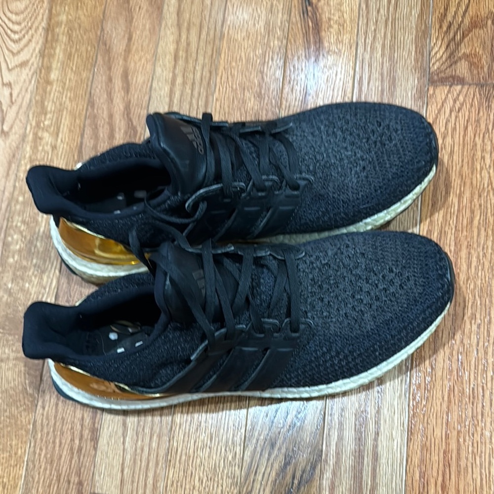 Adidas Black and Gold Ultra-boost Athletic Sneakers